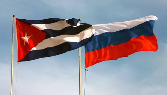 Cuban and Russian flags.