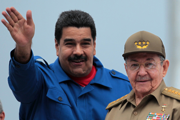 Nicolas Maduro and Raul Castro.