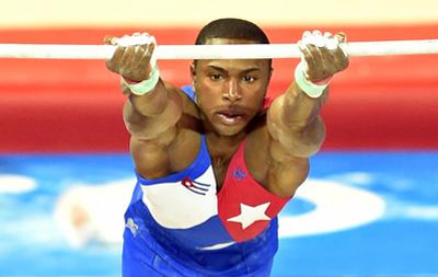 El gimnasta cubano Manrique Larduet, en Barra Fija. AIN FOTO/Ricardo LÓPEZ HEVIA/Periódico Granma El gimnasta cubano Manrique Larduet, en Barra Fija. AIN FOTO/Ricardo LÓPEZ HEVIA/Periódico Granma