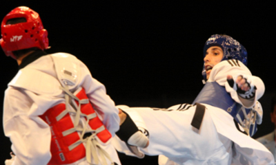 Cubano Osvaldo Llorens (D) avanzó a las semifinales del torneo de taekwondo de los XXII Juegos Centroamericanos y del Caribe. Foto: Armando HERNANDEZ/INDER Osvaldo Llorens durante el combate en los 58 Kg, en taekwondo, en los XXII Juegos Centroamericanos y del Caribe, en Veracruz, México, el 16 de noviembre de 2014. AIN FOTO/Armando HERNANDEZ/INDER
