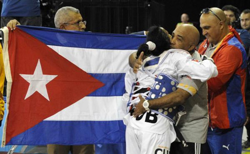 Yania Aguirre de Cuba ( azul ) ganadora de la medalla de oro al derrotar a Itzel Manjarrez de México, en la categoría de los 49 Kg del Taekwondo de los XVII Juegos Panamericanos, en el Centro Deportivo de Mississauga, en Toronto, Canadá, el 19 de julio de 2015. AIN FOTO/ Roberto MOREJON RODRIGUEZ/ Yania Aguirre de Cuba ( azul ) ganadora de la medalla de oro al derrotar a Itzel Manjarrez de México, en la categoría de los 49 Kg del Taekwondo de los XVII Juegos Panamericanos, en el Centro Deportivo de Mississauga, en Toronto, Canadá, el 19 de julio de 2015. AIN FOTO/ Roberto MOREJON RODRIGUEZ/